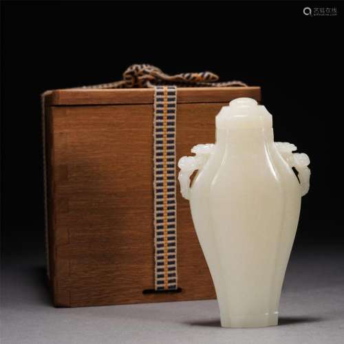 A CHINESE CARVED WHITE JADE VASE WITH COVER