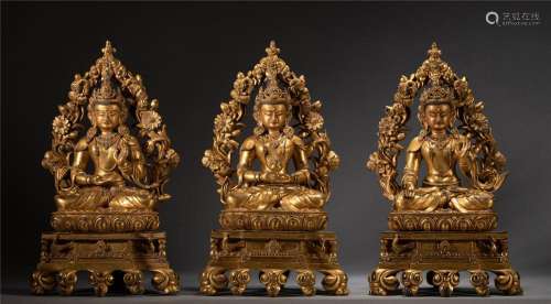 A SET OF THREE SINO-TIBETAN BRONZE-GILT THREE GREAT BUDDHAS ...