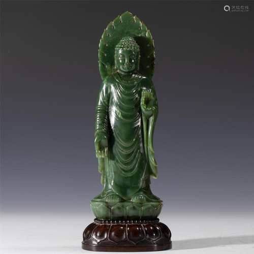 A RARE CHINESE CARVED SPINACH GREEN JADE STANDING BUDDHA