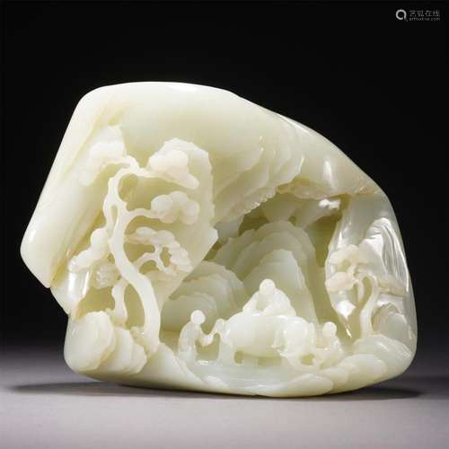 A CHINESE CARVED WHITE JADE BOULDER