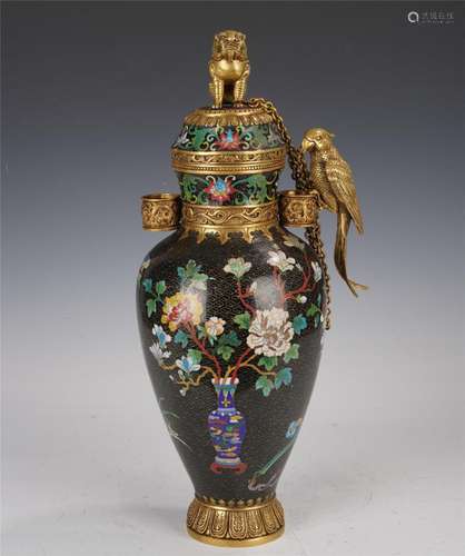 A CHINESE CLOISONNE ENAMEL VASE WITH COVER