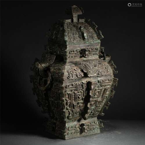 A HIGHLY IMPORTANT CHINESE ARCHAISTIC BRONZE WINE VESSEL LEI