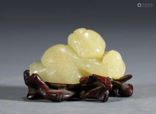 A CHINESE YELLOW JADE BOY CARVING