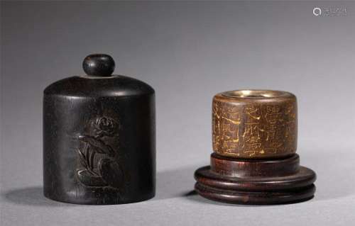 A CHINESE INSCRIBED ALOESWOOD ARCHER RING