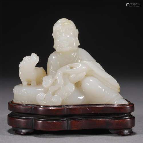 A CHINESE CARVED WHITE JADE LUOHAN