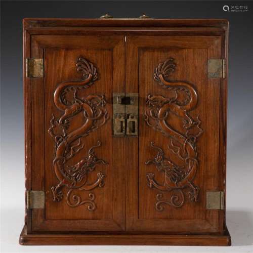 A CHINESE CARVED ALOES WOOD CABINET