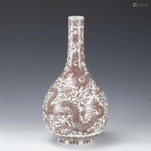 A CHINESE COPPER RED DRAGON BOTTLE VASE