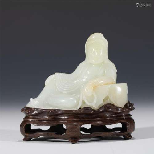A CHINESE CARVED WHITE JADE GUANYIN
