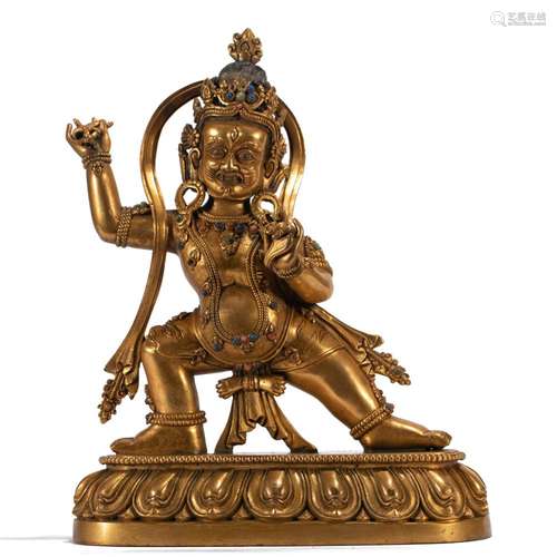 A TIBETAN BRONZE-GILT VAJRAPANI