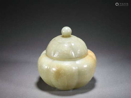A Carved White Jade Jar with Cover
