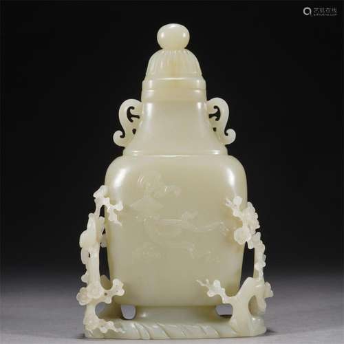 A CHINESE CARVED WHITE JADE VASE