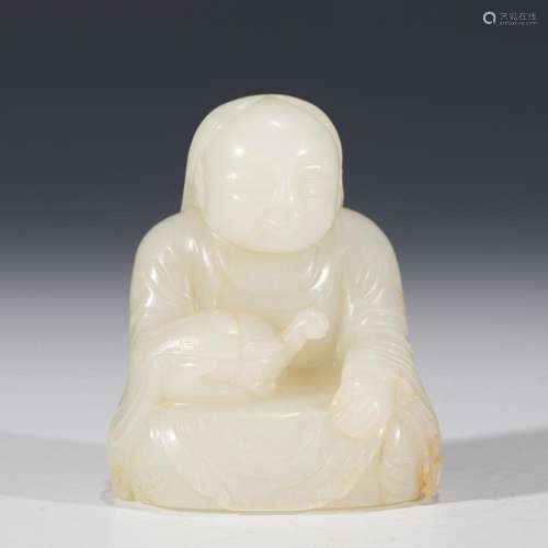 AN UNUSUAL CHINESE CARVED WHITE JADE FIGURE