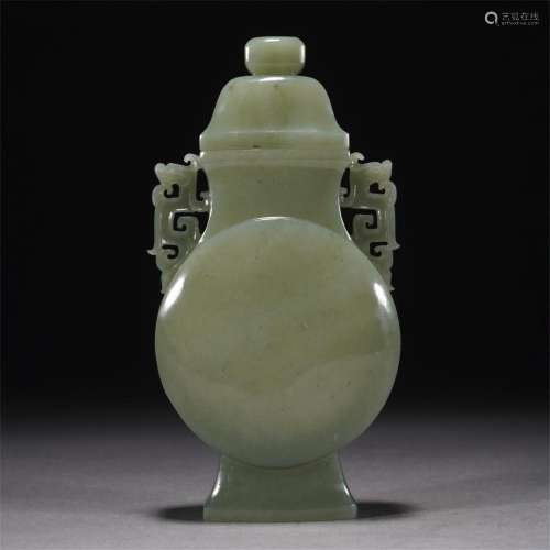 A CHINESE CARVED CELADON JADE MOON FLASK