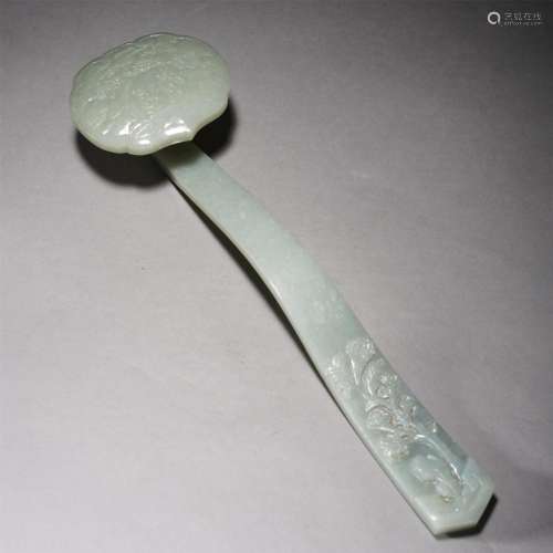 A CHINESE CARVED CELADON JADE RUYI SCEPTER