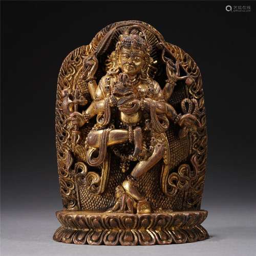 A TIBETAN BRONZE-GILT DAKINI