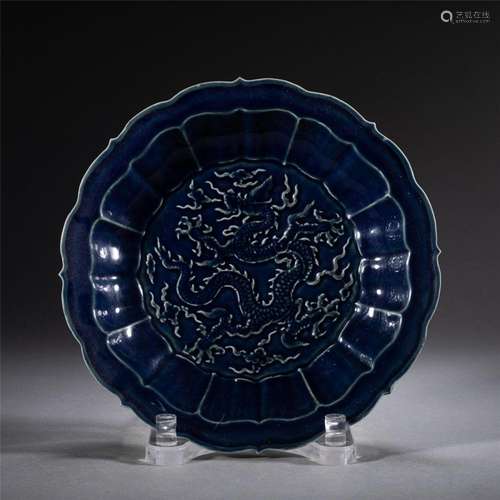 A CHINESE BLUE AND WHITE DRAGON DISH