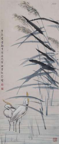 A CHINESE PAINTING OF REEDS AND EGRETS SIGNED XU BEIHONG
