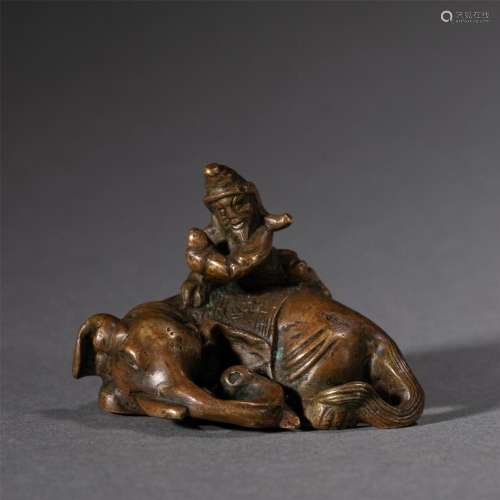 A CHINESE BRONZE FIGURE WITH ELEPHANT DECORATION