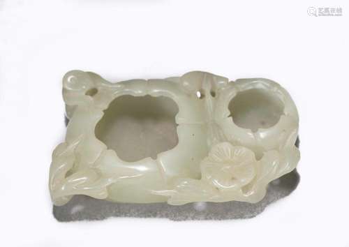 A CHINESE CARVED WHITE JADE WASHER