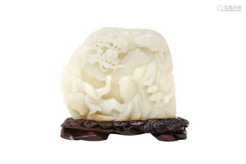 A CHINESE CELADON JADE 'DRINKING SCHOLAR' BOULDER CARVING 二...