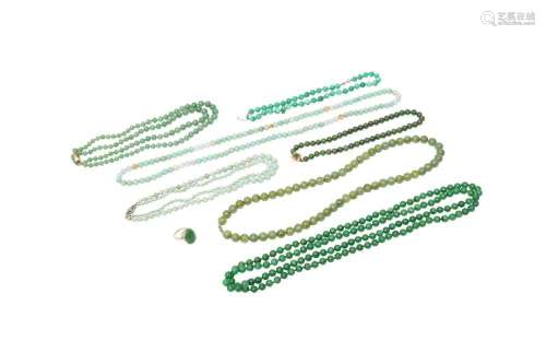 A GROUP OF SEVEN CHINESE JADE NECKLACES AND A RING 二十世紀 ...