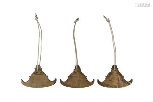 A SET OF THREE BURMESE BRONZE 'STUPA' GONGS, KYIZI OFFERED O...