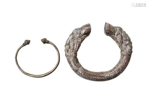 TWO NEPALESE WHITE-METAL BRACELETS OFFERED ON BEHALF OF PROS...