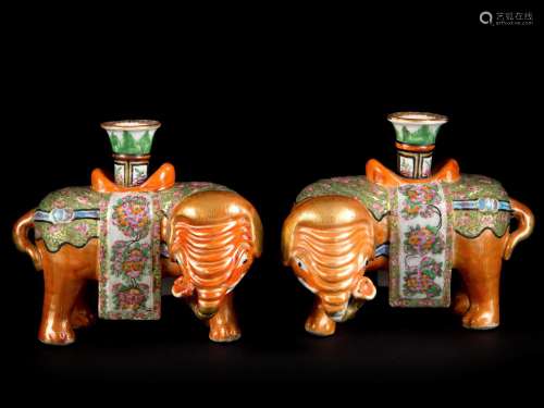 A PAIR OF FAMILLE ROSE ‘ELEPHANT AND VASE’ CANDLE HOLDERS