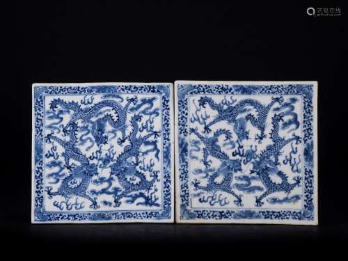 A PAIR OF BLUE AND WHITE TILES