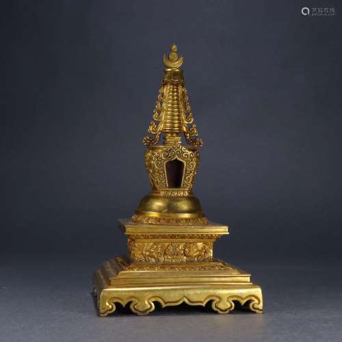: gold stupaSize: 11.8 cm high 21.5 cm wide weighs 1826 g.