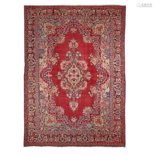 AN ORIENTAL CARPET