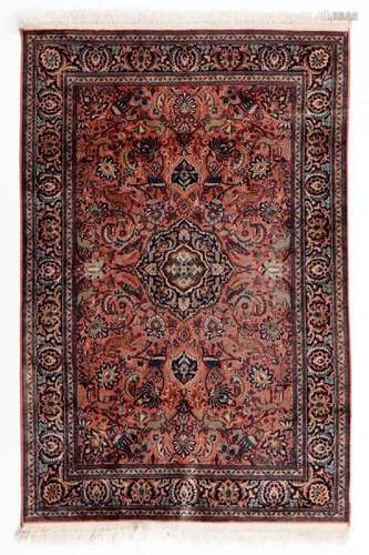 AN ORIENTAL CARPET