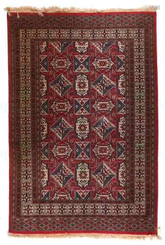 AN ORIENTAL CARPET