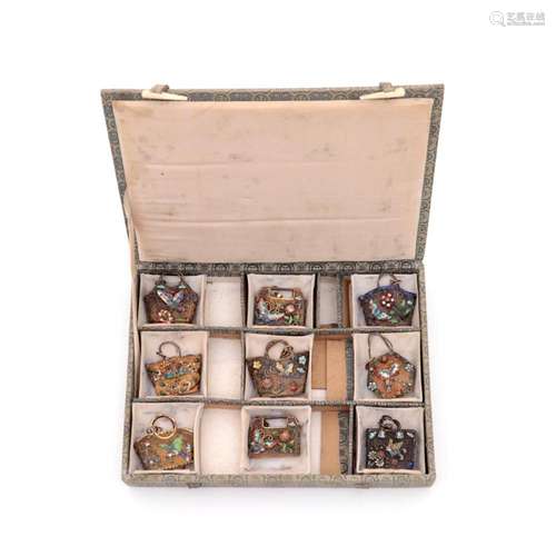 A SET OF NINE MINIATURE PURSES