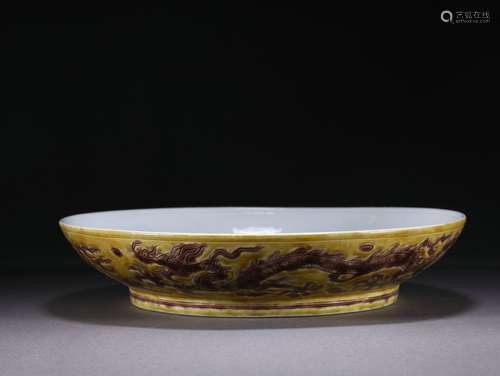 A Chinese Yellow Ground and Aubergine Glaze Dragon Dish