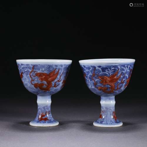 A pair of blue and white alum red cups