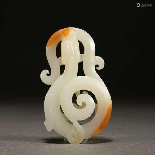 A white jade dragon ornament