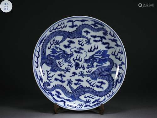 A Large platter with blue and white double dragon pattern