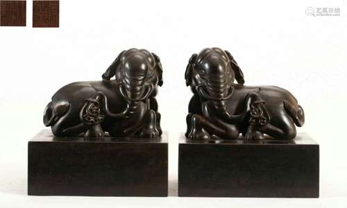 A pair of Rosewood elepant seals