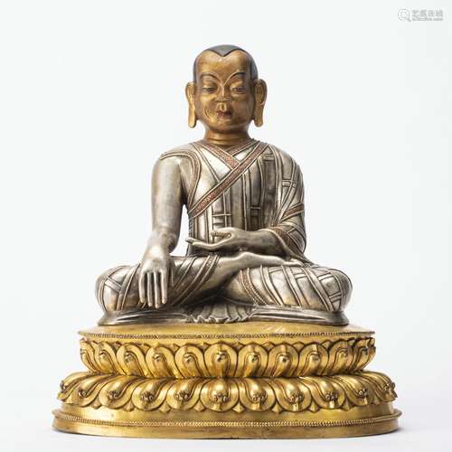 A Silver Gilt Buddha Statue