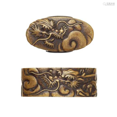 Fuchi-kashira. Sentoku. 19. Jh.<br/>Sign.: Umetada Nar...