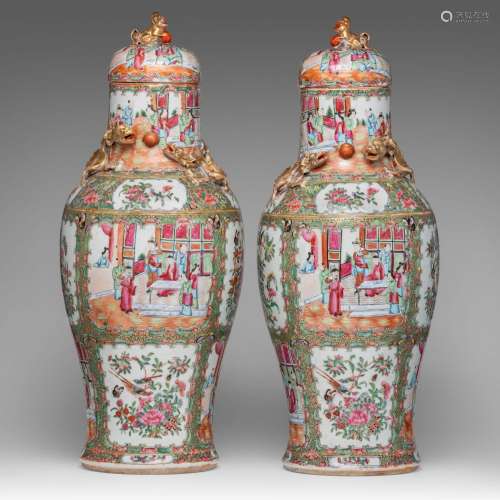 A pair of Chinese Canton famille rose baluster vases and lid...