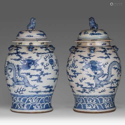 A pair of Chinese blue and white 'Dragon' covered vases, 19t...