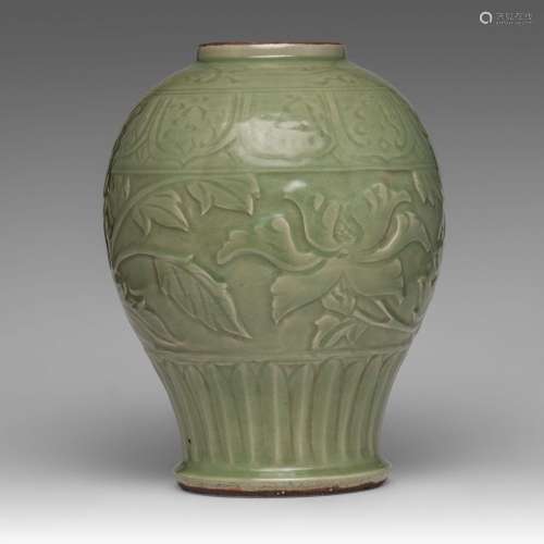 A Chinese carved Longquan celadon 'Peony' jar, Ming dynasty,...