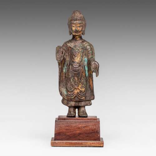 A gilt bronze standing Udhyana Buddha, Chinese Sui/Tang (ca....