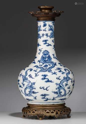 A Chinese blue and white 'Dragons' bottle vase, Guangxu peri...