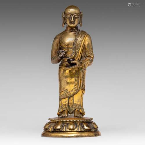 A Chinese-Tibetan gilt bronze figure of an Arhat, 18thC, H 1...