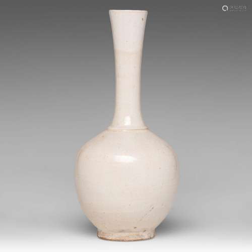A Chinese cream-glazed bottle vase, Song-Ming dynasty, H 31 ...