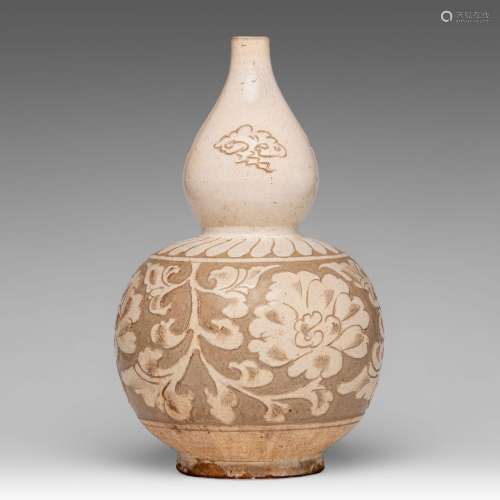 A Chinese carved Cizhou ware double-gourd vase, H 32 cm