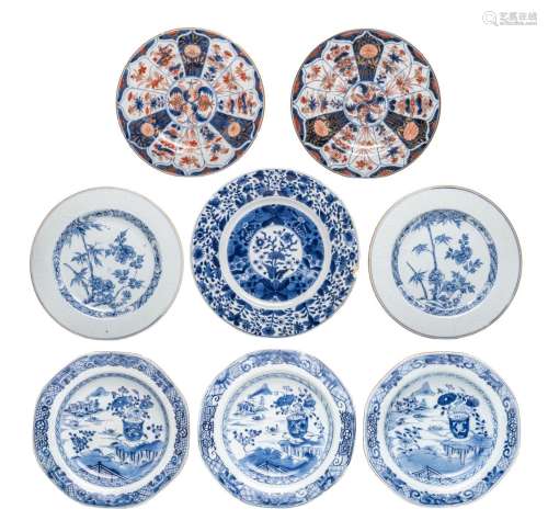 A collection of eight Chinese blue and white and Imari dishe...